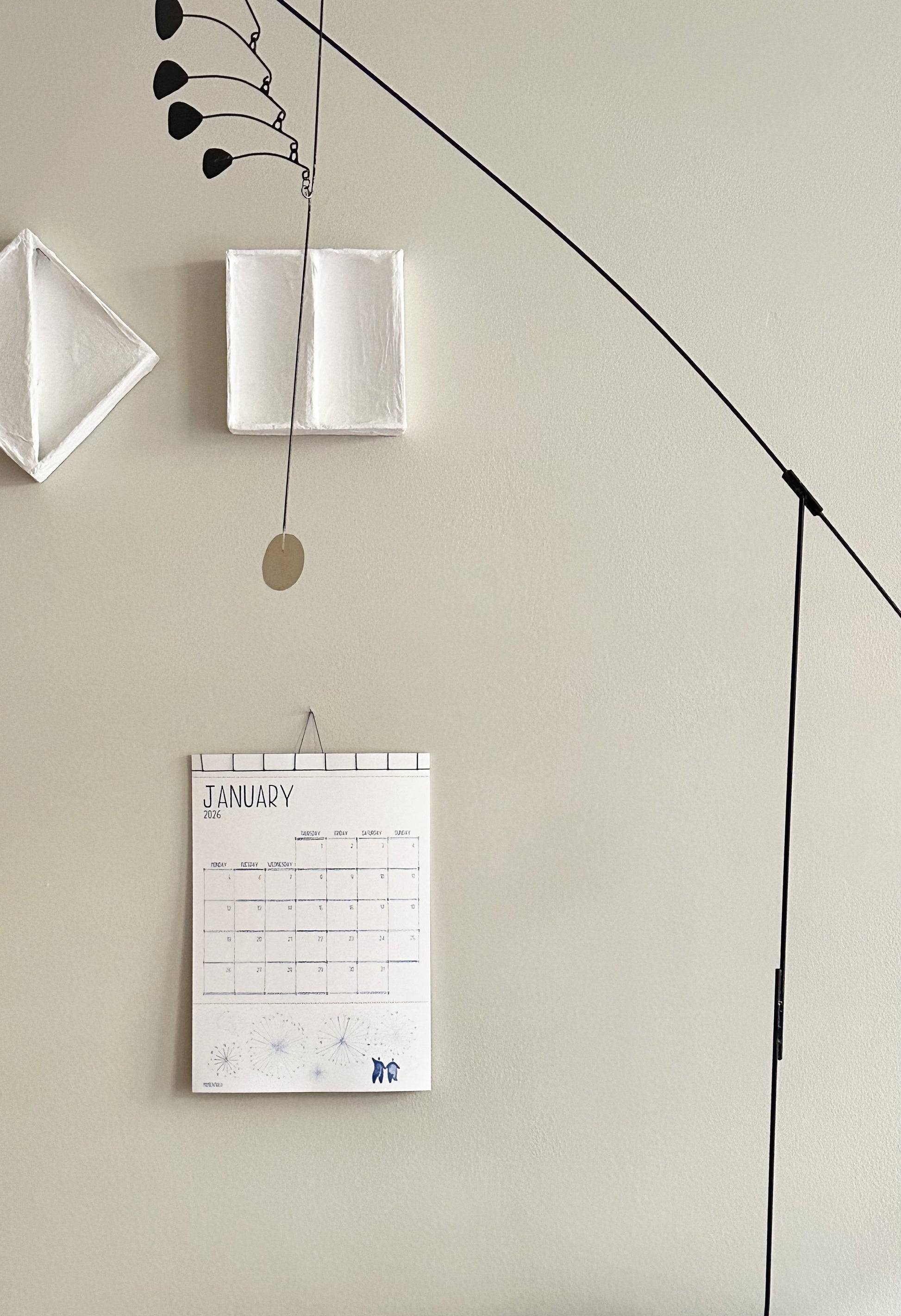 Calendar on a wall with minimal decor